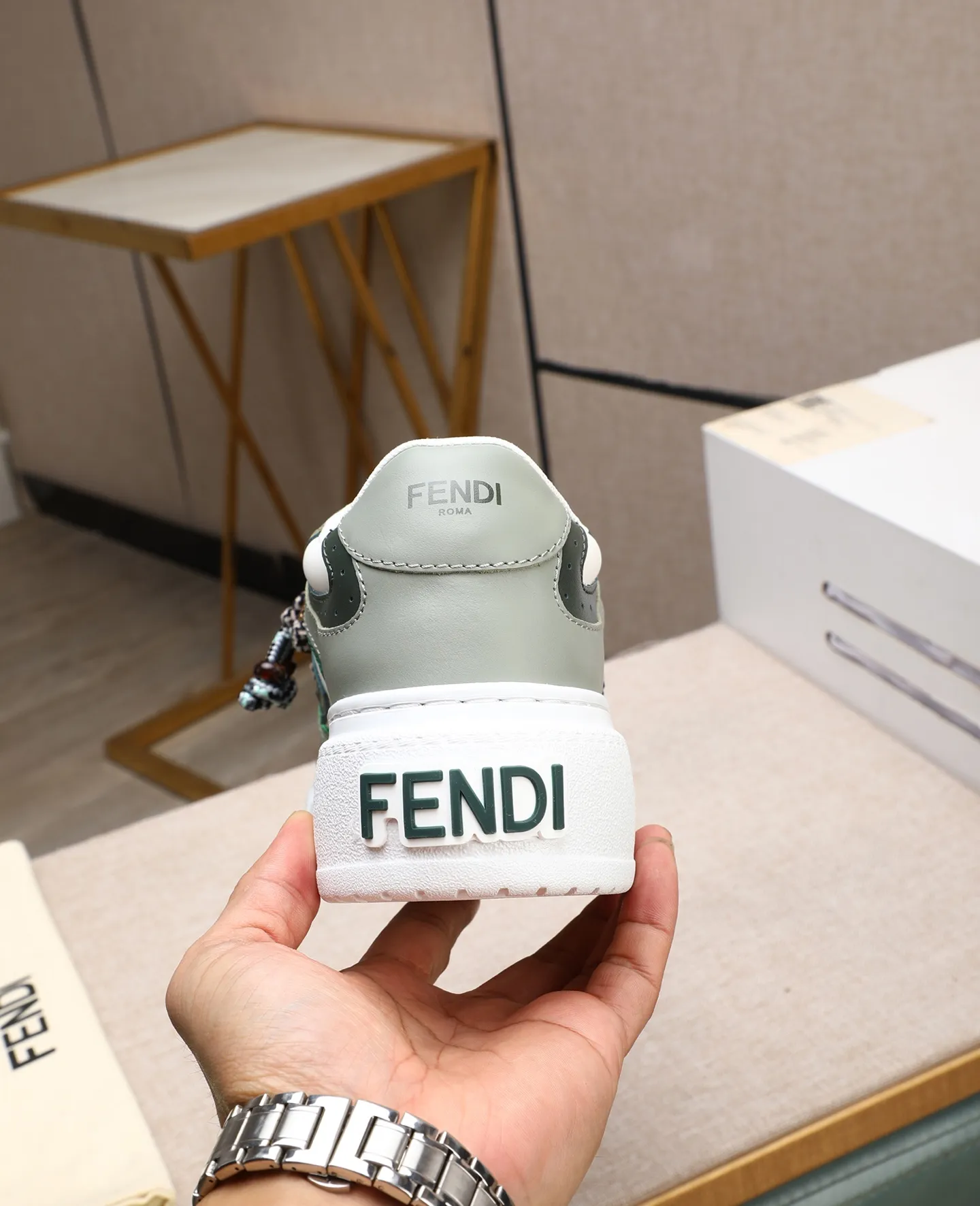 Men's shoes 💰740 Top quality Fendi Match series 25 latest colors Pendant thick sole lace casual FENDI Match lace. Made of light pink leather with white and ocher brown details. Contrast leather FF appliqué on the sides and hiking laces in white, pink and ocher brown. Thick rubber sole with oversized embossed FENDI lettering on the heel. Metal ring charm on the tongue: A small braided doll with contrasting mink fur details and gold metallic FF on the right shoe. The left shoe features a braided cord with contrasting mink double pom poms, metallic FF beads, and Pequin print pattern and logo. Upper: Original custom-made imported first-layer cowhide. Inner lining: Imported custom-made breathable mesh lining. Sole: Original open-molded ultra-light foam material. Bottom thickness: 5CM. Number of yards: women's 35-40 (custom-made 40 non-refundable).